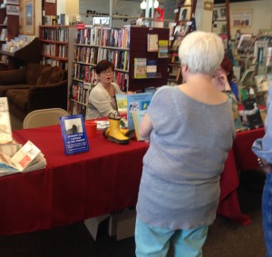 Author, Paula Helgerson chats with visitors 